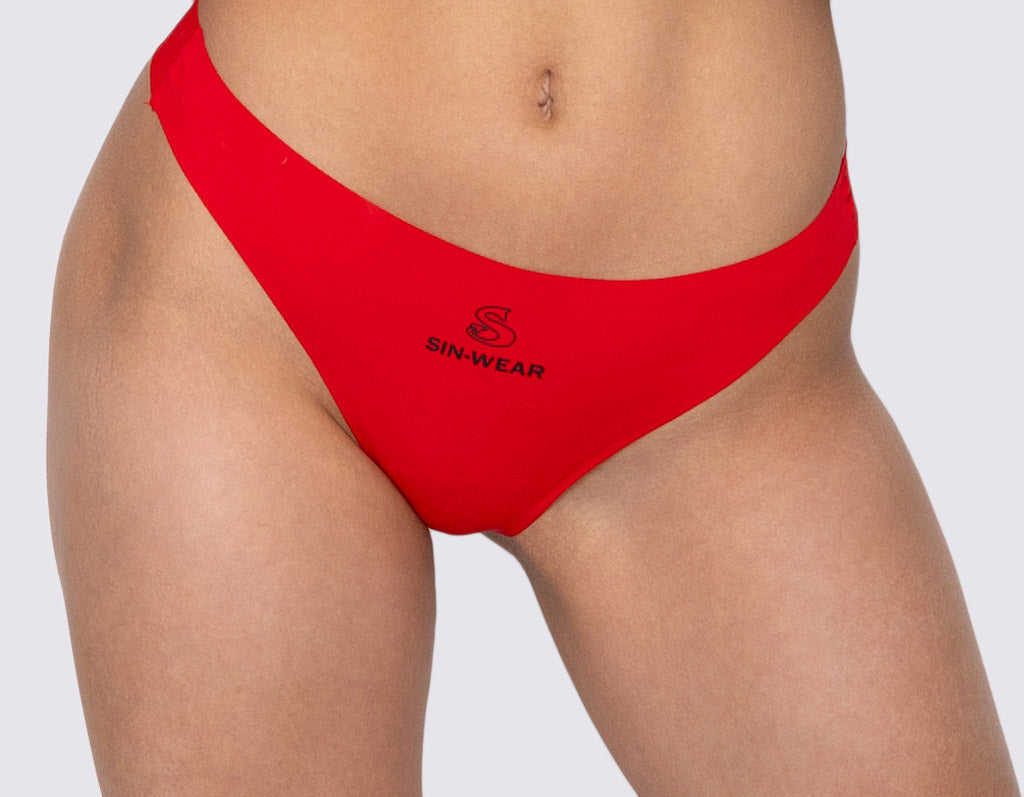 Red bikini bottom with 'Sin-Wear' brand logo on a plain background