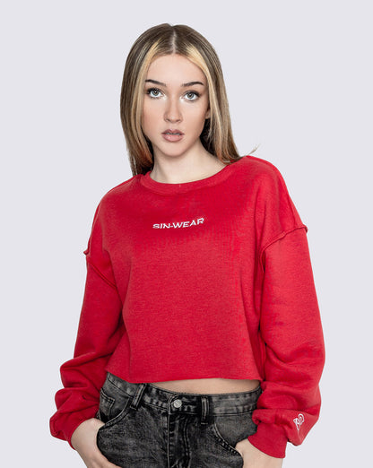Person wearing a red crop sweatshirt with 'Sin-Wear' logo on a white background