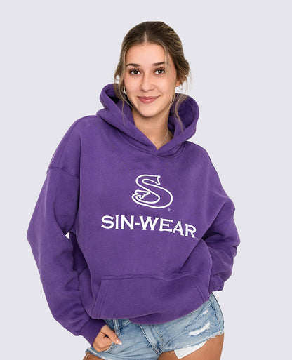 Person wearing a purple hoodie with 'SIN-WEAR' logo on a plain background