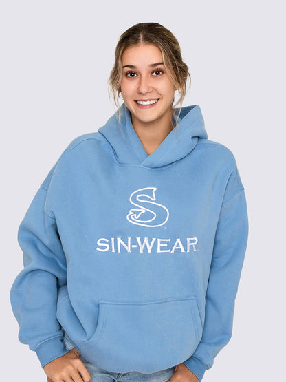 Person wearing a blue hoodie with 'SIN-WEAR' logo on a light gray background